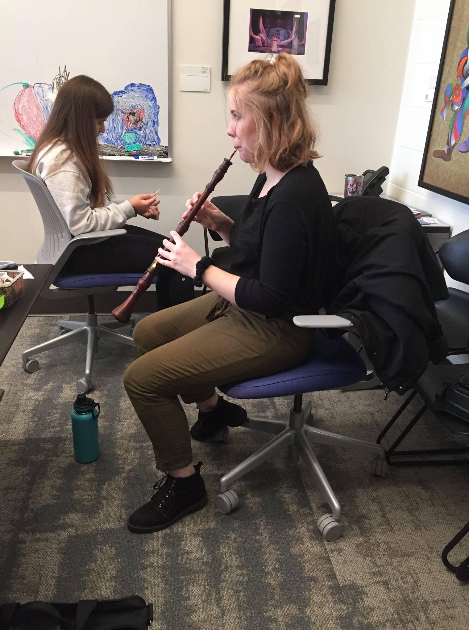 Emily Walker playing her Baroque oboe at the GVSU Reed Making Workshop 2019.